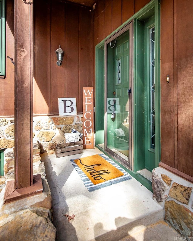 doorway to property featuring a porch