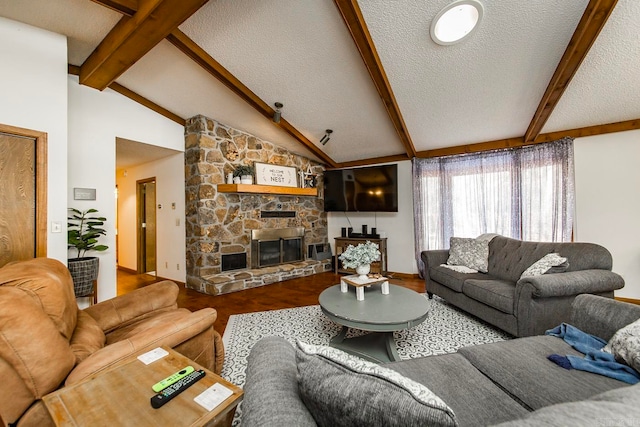 living room with a textured ceiling, vaulted ceiling with beams, wood-type flooring, and a stone fireplace