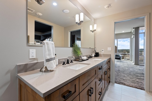 bathroom with tile patterned flooring and vanity