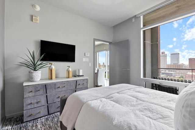 bedroom featuring multiple windows