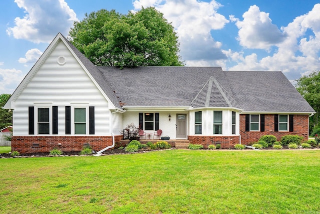 view of front facade featuring a front yard