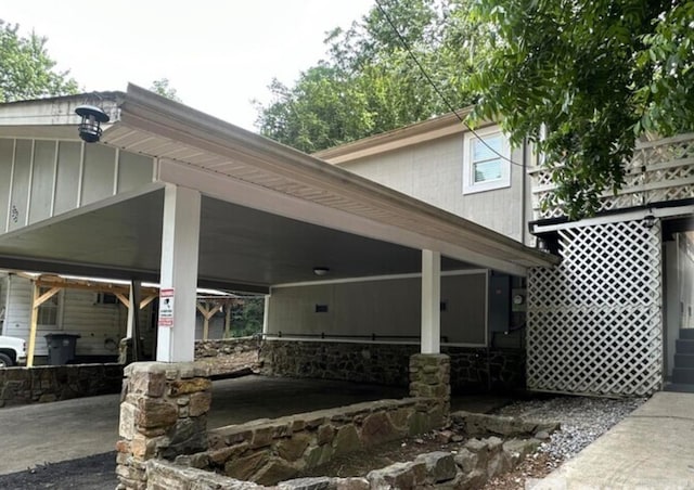 exterior space with a carport