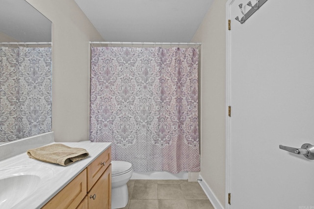 full bathroom with vanity, toilet, shower / tub combo with curtain, and tile patterned flooring