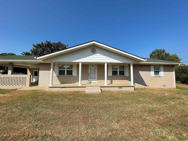 ranch-style house featuring a porch and a front lawn