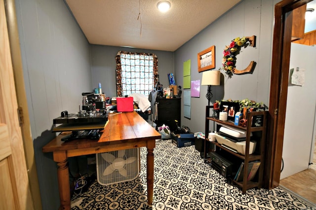 home office with a textured ceiling