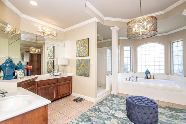 bathroom with tile patterned flooring, ornamental molding, decorative columns, and vanity