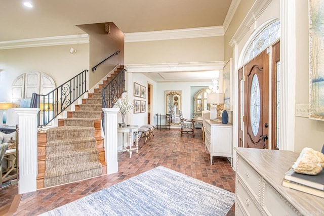 entryway with crown molding