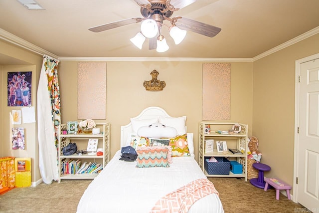 bedroom featuring ornamental molding, ceiling fan, and carpet floors