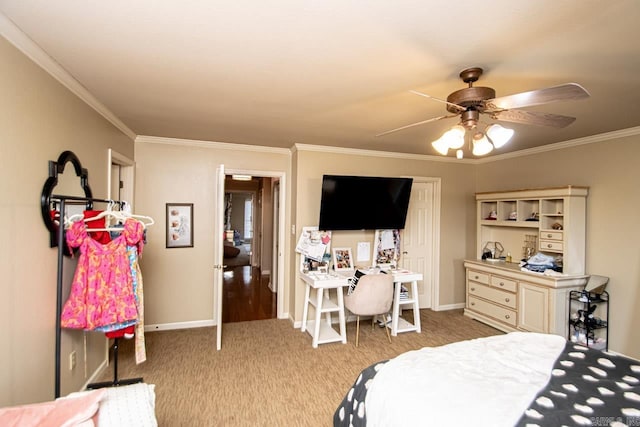 carpeted bedroom featuring crown molding and ceiling fan