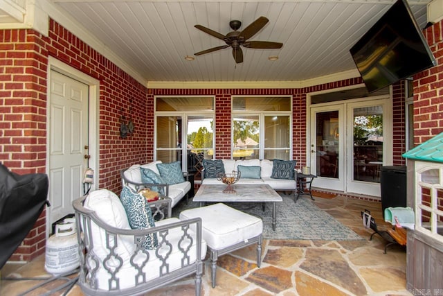 view of patio with french doors and ceiling fan