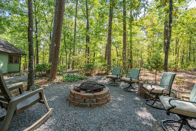 view of patio with a fire pit