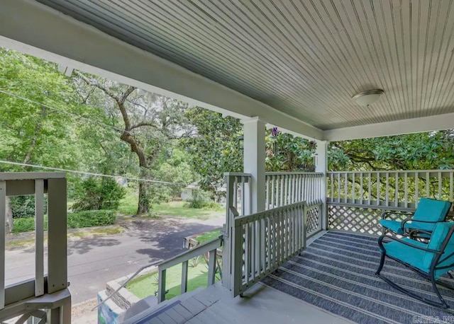 wooden terrace with covered porch