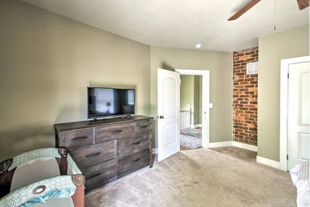 bedroom featuring baseboards, ceiling fan, and carpet flooring