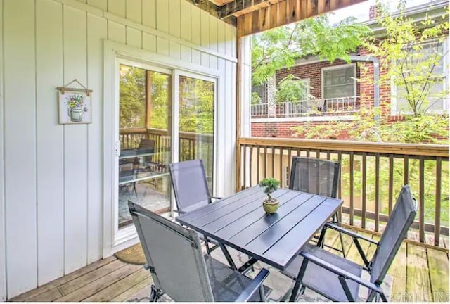 deck featuring outdoor dining area