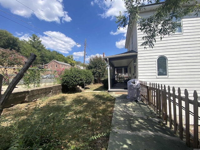 view of yard featuring fence