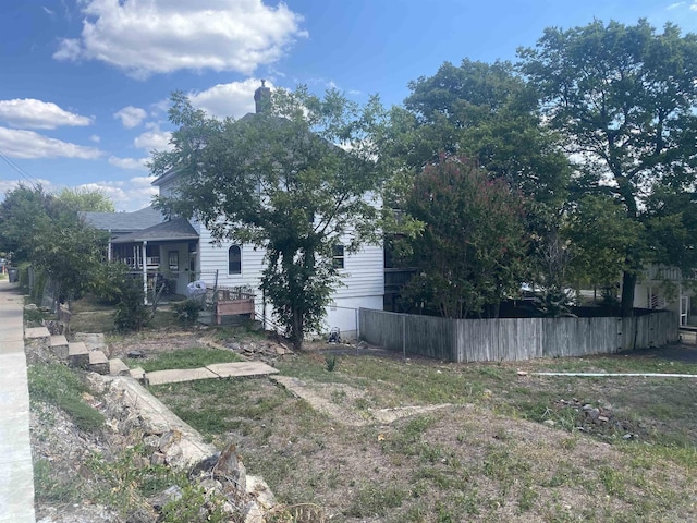 view of yard with fence