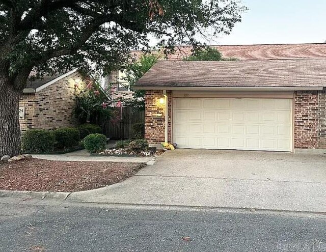 ranch-style home with a garage