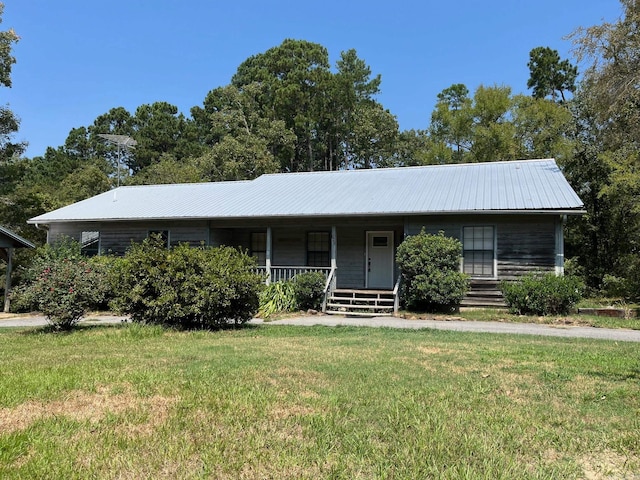 single story home with a front lawn and a porch