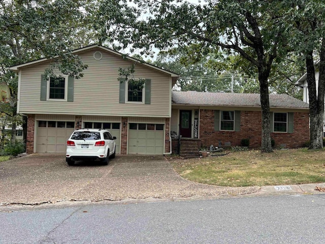 split level home featuring a garage