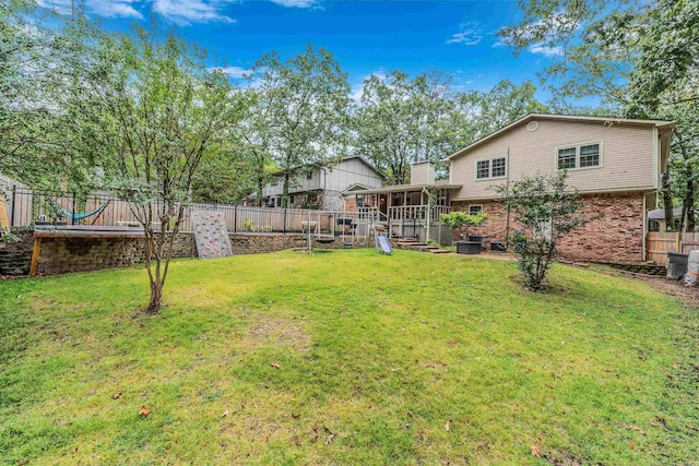 view of yard with a sunroom