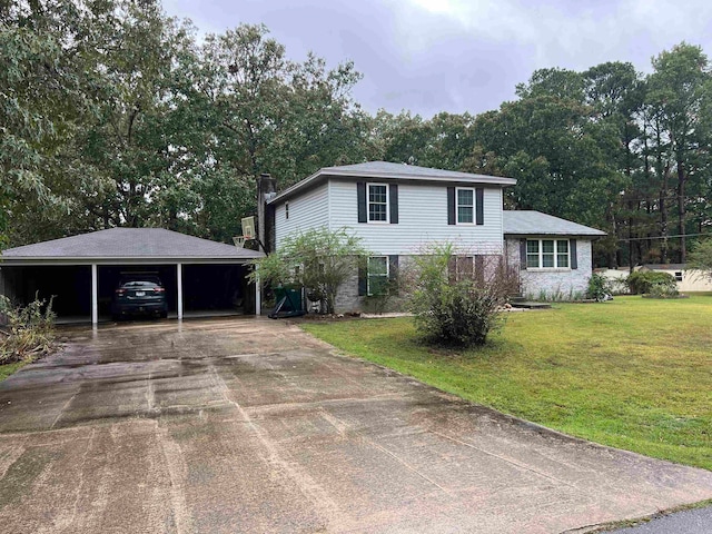 view of front of house featuring a carport, a front yard, driveway, and a chimney