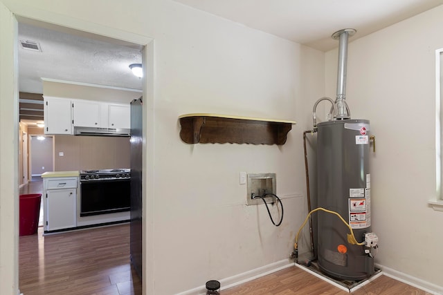 utility room with water heater