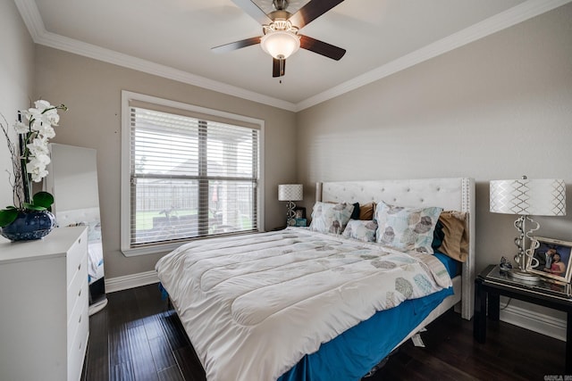 bedroom with crown molding, dark hardwood / wood-style flooring, and ceiling fan