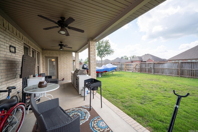 view of patio / terrace with ceiling fan