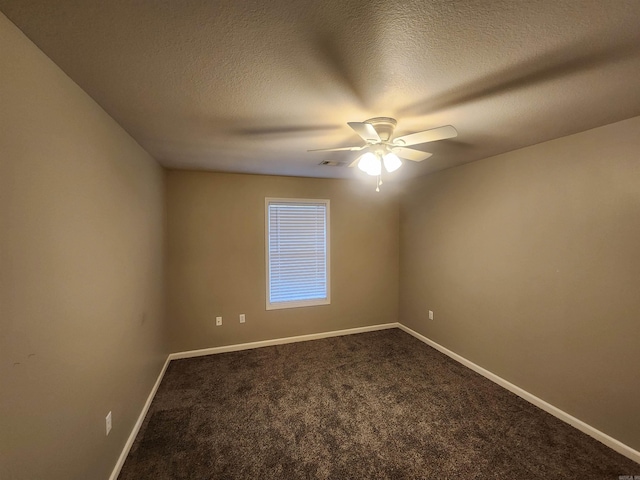 unfurnished room featuring carpet flooring, a textured ceiling, and ceiling fan