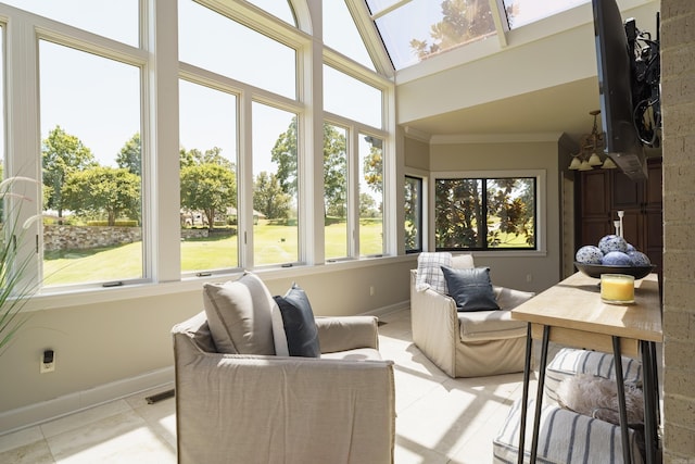 sunroom with plenty of natural light and a skylight