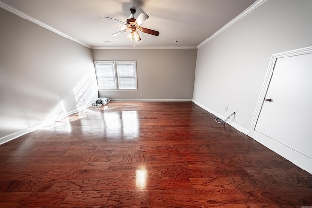 unfurnished room with ornamental molding, ceiling fan, and dark hardwood / wood-style floors