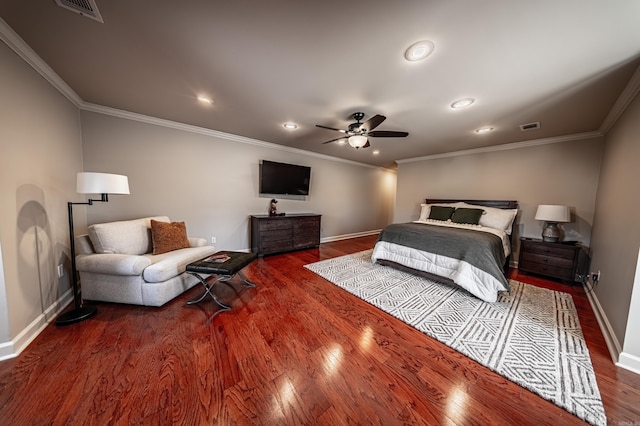 bedroom featuring ceiling fan, dark hardwood / wood-style floors, and ornamental molding