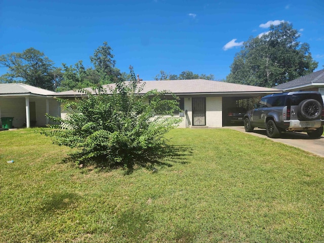 single story home featuring a front yard and a carport