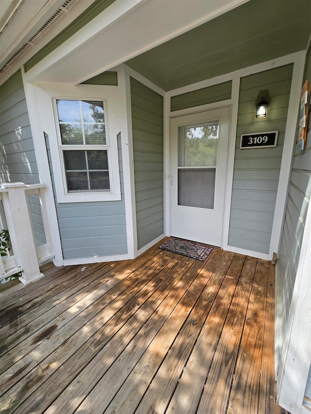 wooden deck featuring a porch