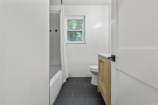 full bathroom featuring toilet, tile patterned flooring, vanity, tile walls, and shower / bath combination with curtain