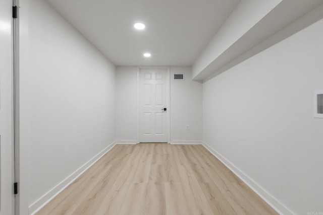 empty room with light wood-type flooring