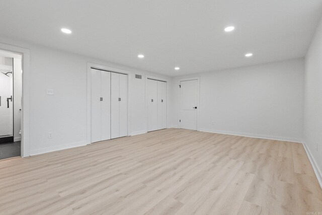 unfurnished room featuring light hardwood / wood-style flooring