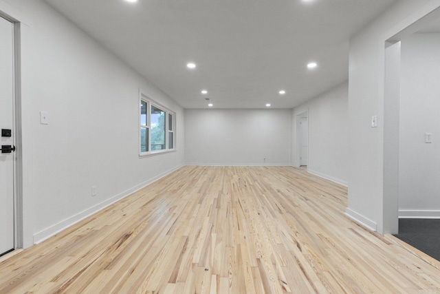 unfurnished room featuring light wood-type flooring