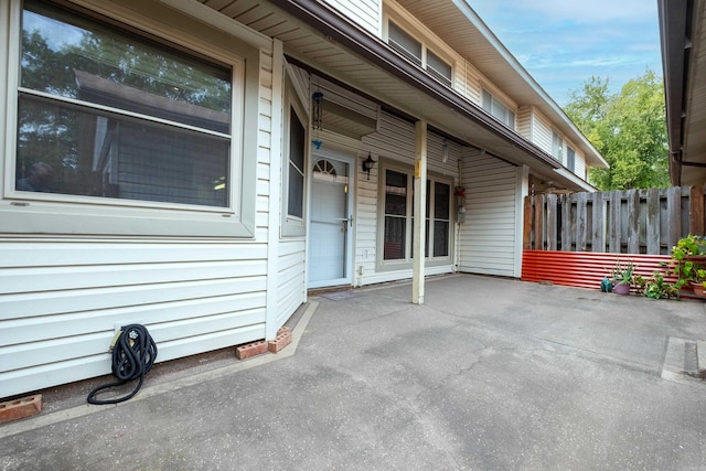 property entrance with a patio