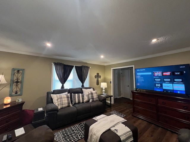 living room featuring dark hardwood / wood-style flooring and ornamental molding