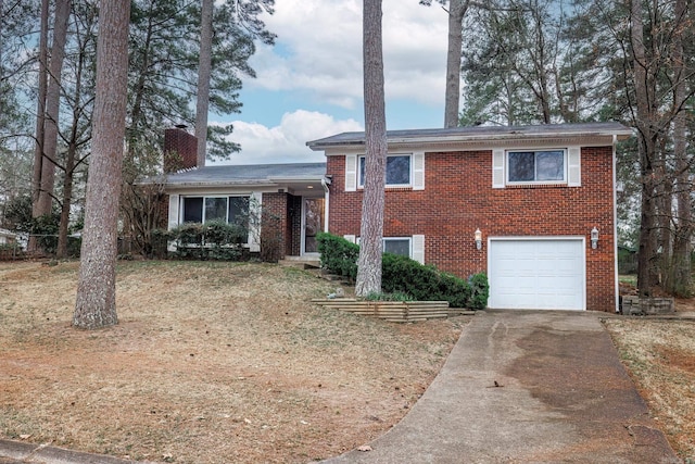 split level home featuring a garage