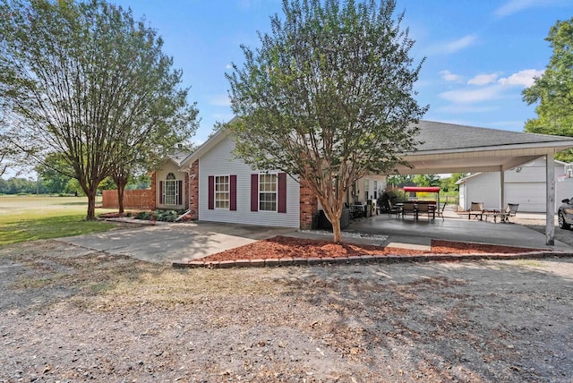 view of front of home with a patio area