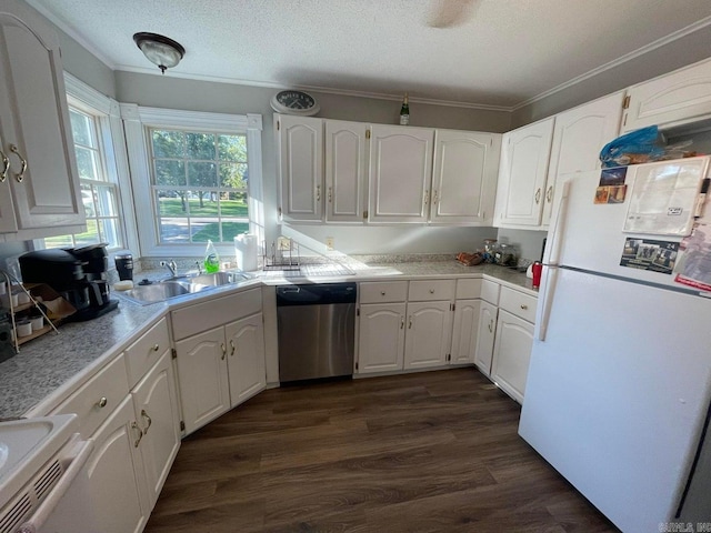 kitchen featuring white refrigerator, white cabinetry, stainless steel dishwasher, and dark wood-type flooring