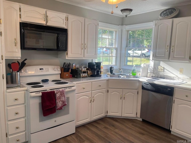 kitchen with white cabinetry, sink, electric range, dark wood-type flooring, and stainless steel dishwasher