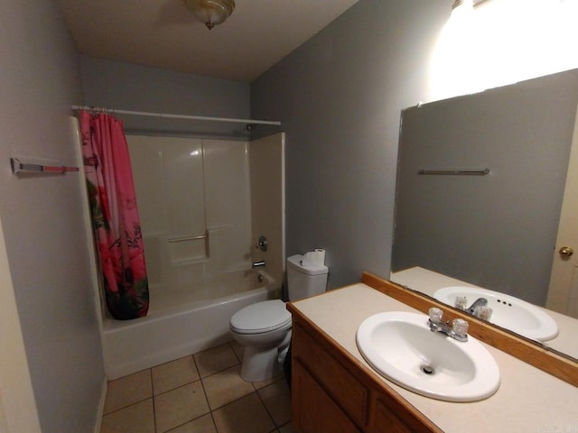 full bathroom featuring tile patterned flooring, toilet, shower / tub combo with curtain, and vanity