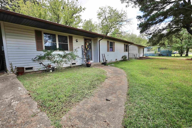 ranch-style house with a front yard