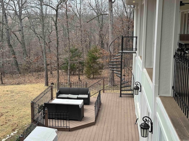 wooden deck featuring an outdoor living space