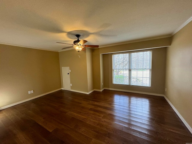 unfurnished room featuring ornamental molding, dark wood-type flooring, a textured ceiling, and ceiling fan