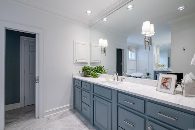 bathroom with crown molding and vanity