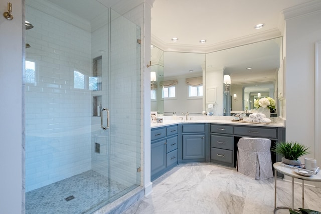 bathroom featuring crown molding, vanity, and a shower with shower door